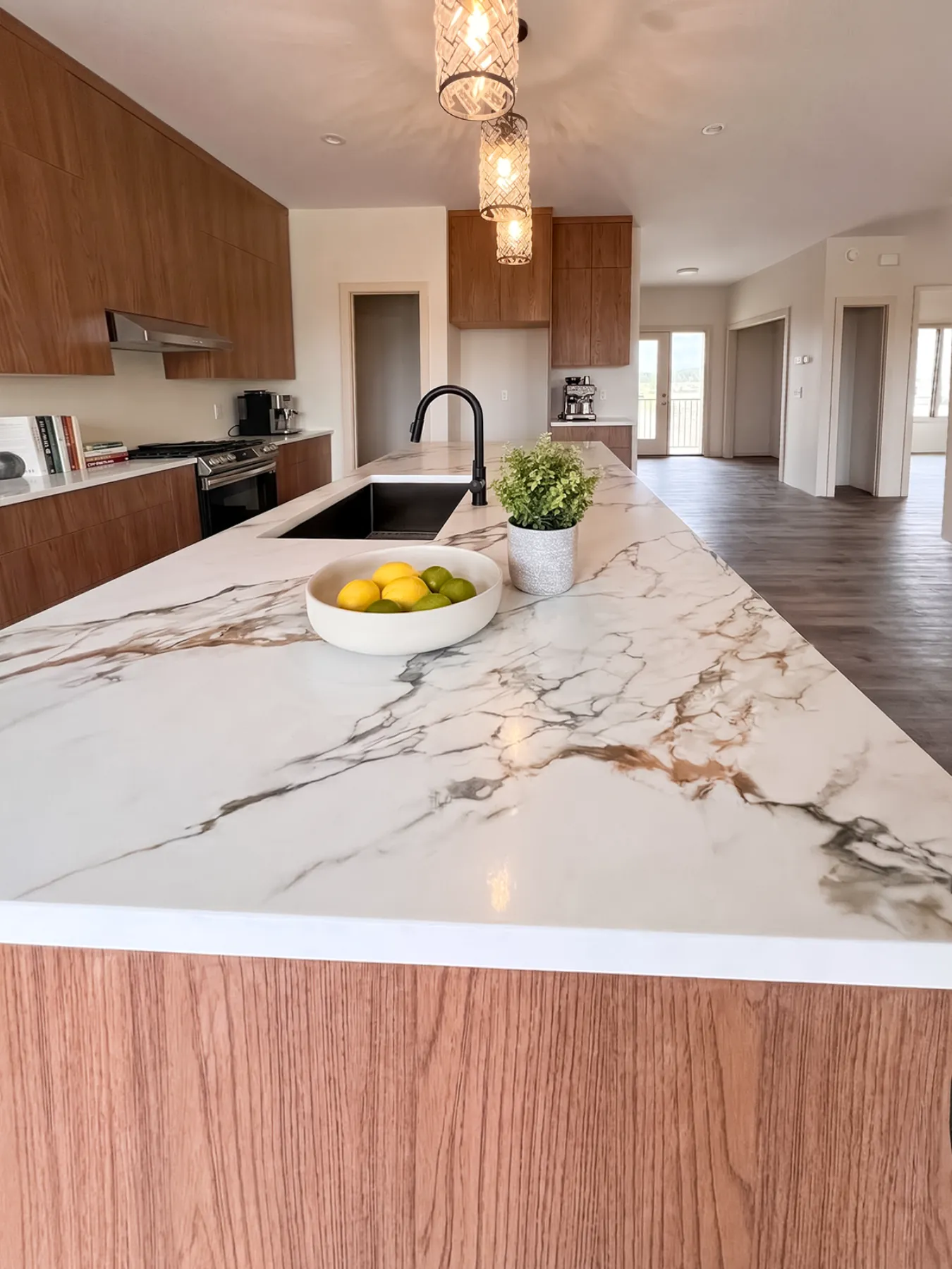 Island top showing gold and grey veining running the length of the slab